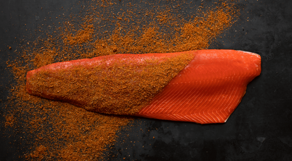 Sockeye salmon fillet sprinkled with spices picture from the Mentor Creative Goup case study