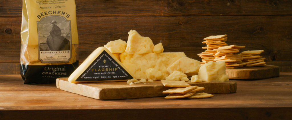 Beechers flagship cheese and crackers set out on a cheeseboard